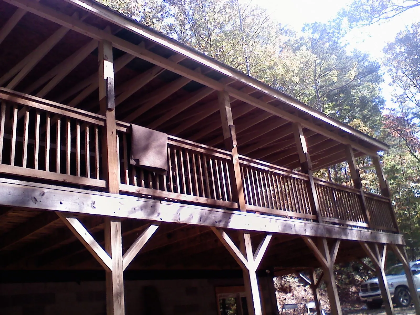 Timber framing under a new elevated porch and deck — Roof Leak Repair in Stoughton by Roofing Brothers